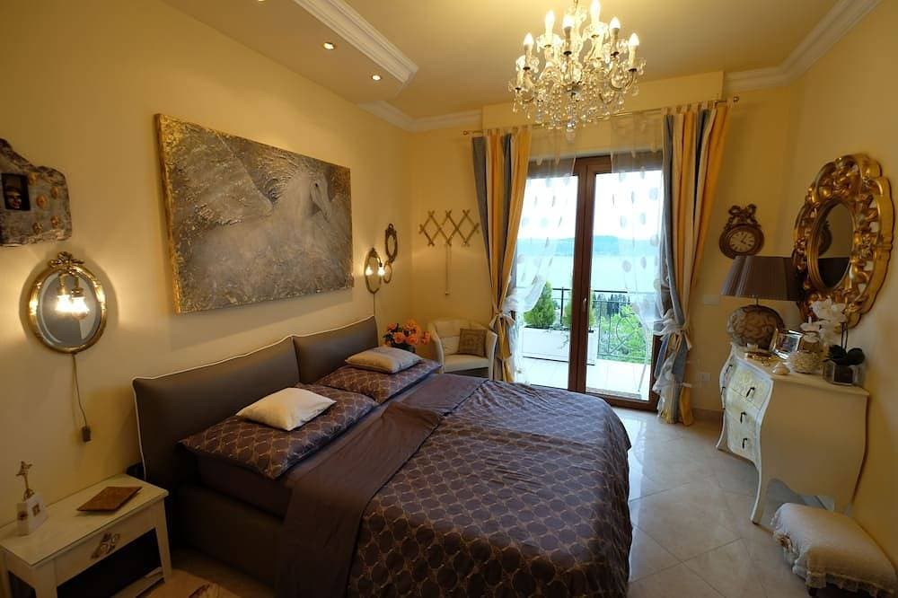 Foto 5 von 23: Wohnluxus auf 100m2 mit grandiosem Gardaseeblick - Golf-und Bikerparadies