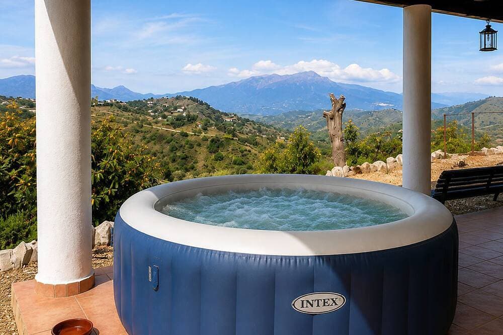 Foto 11 von 28: Country House with a Jacuzzi, Pool, and Spectacular Mountain Views