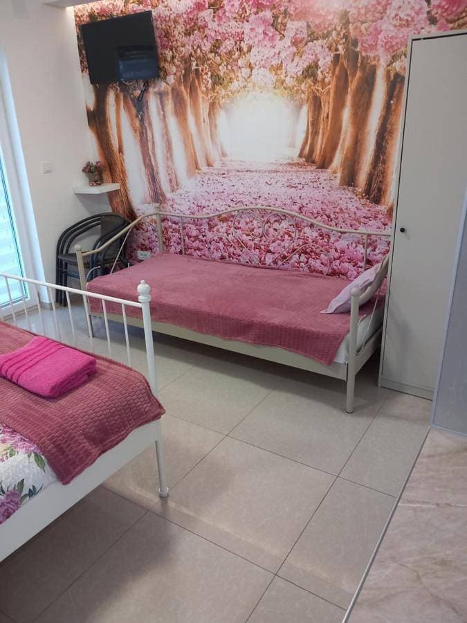 Foto 4 von 8: Quadruple Room