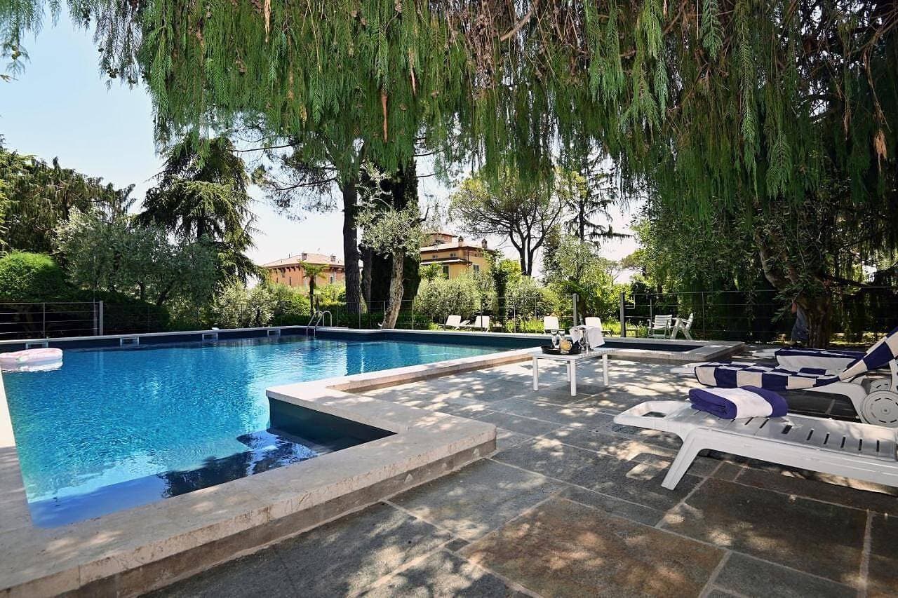 Foto 11 von 40: Ferienwohnung Al Segnavento Tramontana mit Pool, Terrasse & Parkplatz am Seeufer