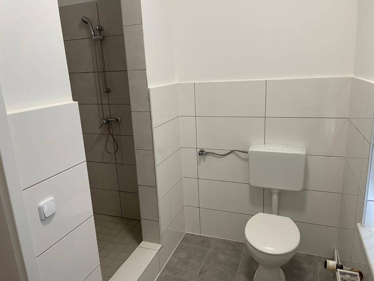 Foto 6 von 25: Triple Room with Private Bathroom