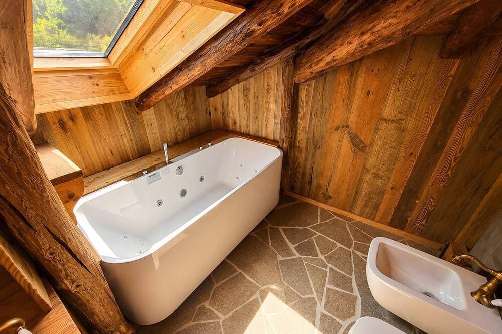 Foto 5 von 25: Zimmer „Camera Rododendro“ mit Bergblick, WLAN und Klimaanlage