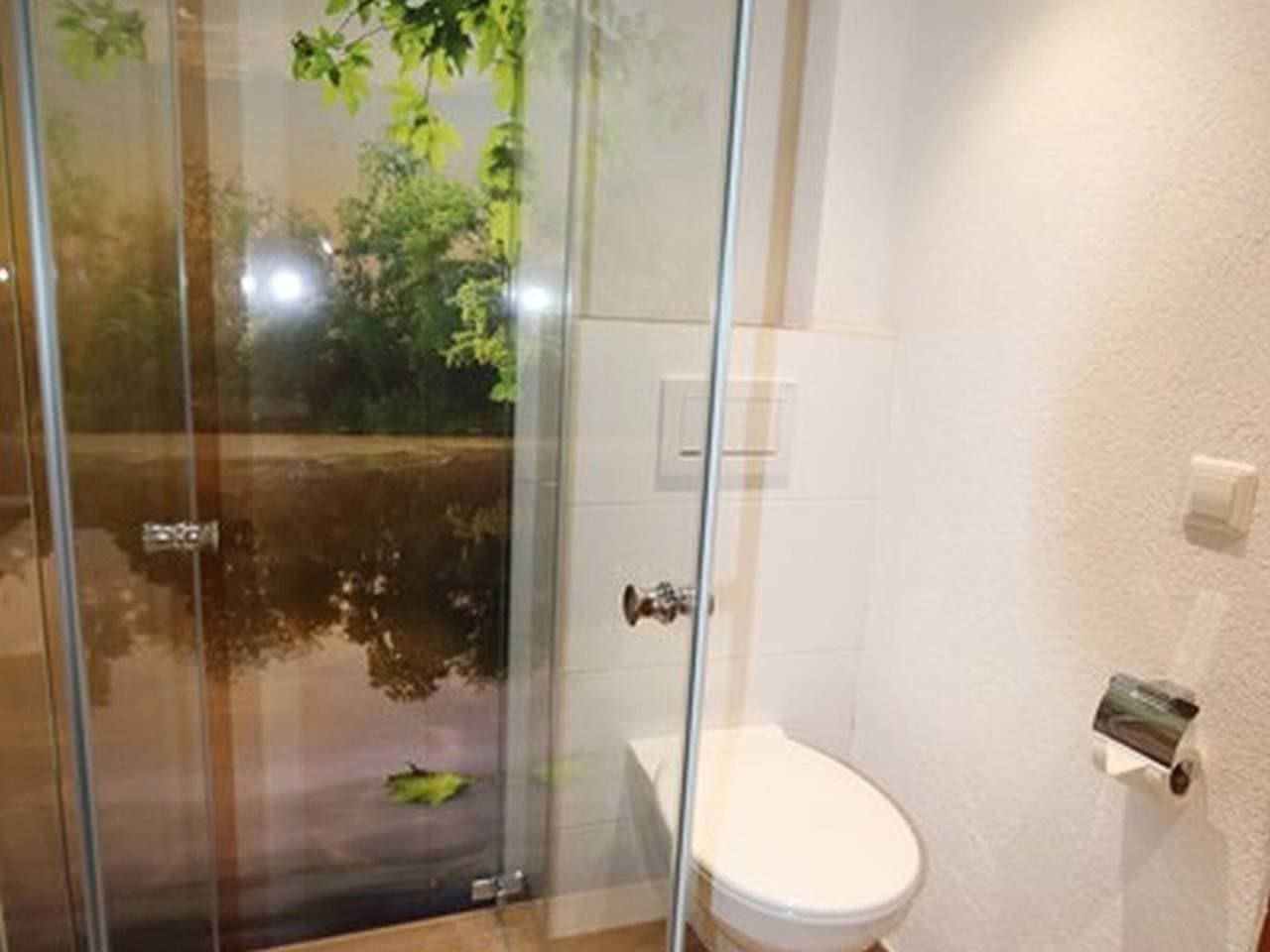 Foto 12 von 38: Zimmer 'Gästezimmer' mit privater Terrasse, Gemeinschaftsgarten und Wi-Fi