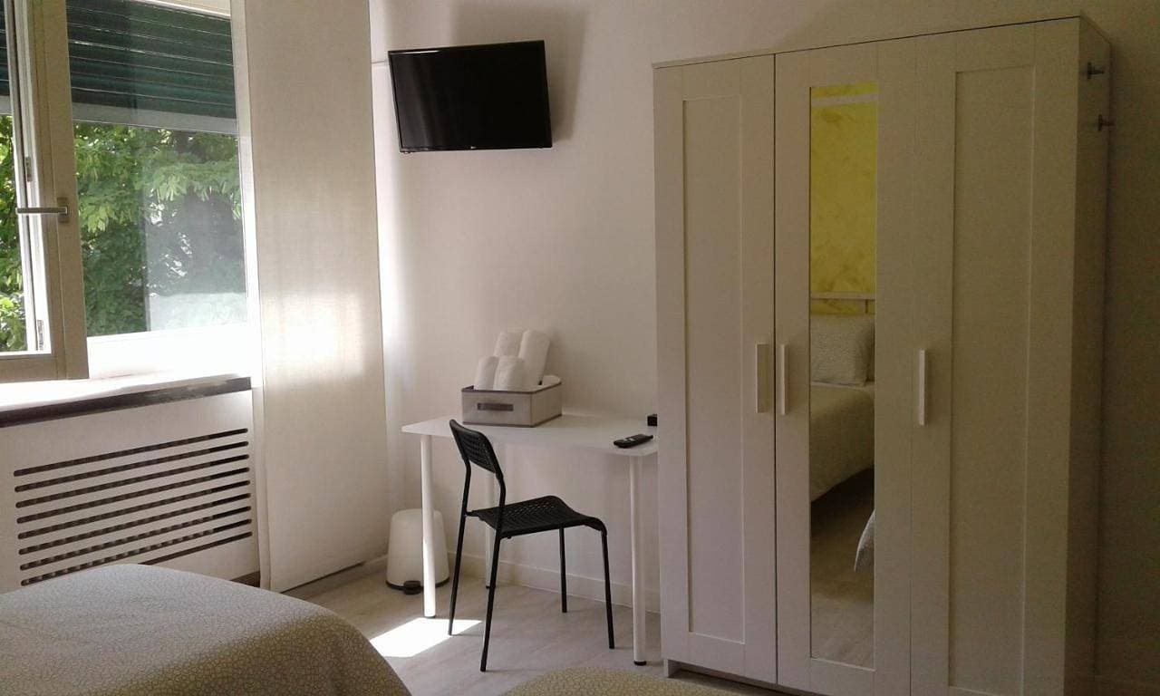 Foto 7 von 15: Basic Triple Room with Shared Bathroom