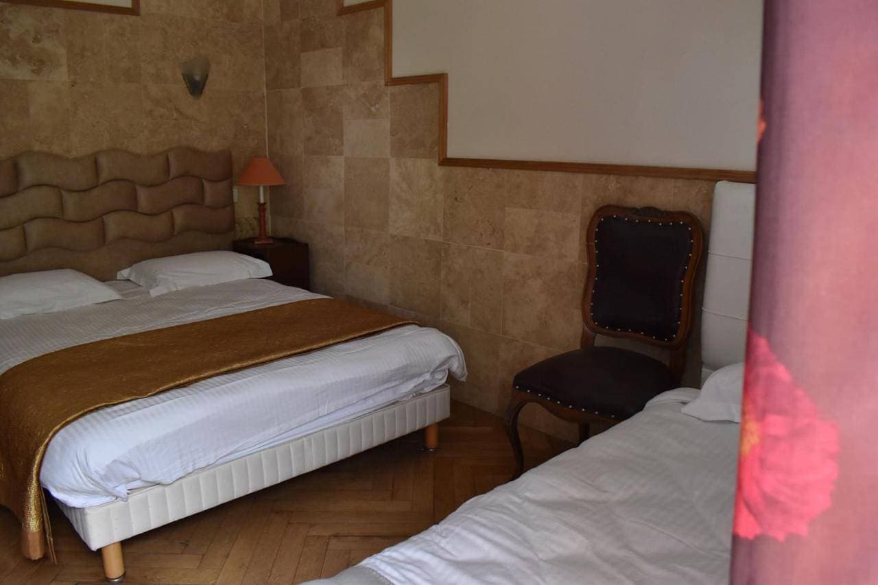 Foto 6 von 11: Triple Room