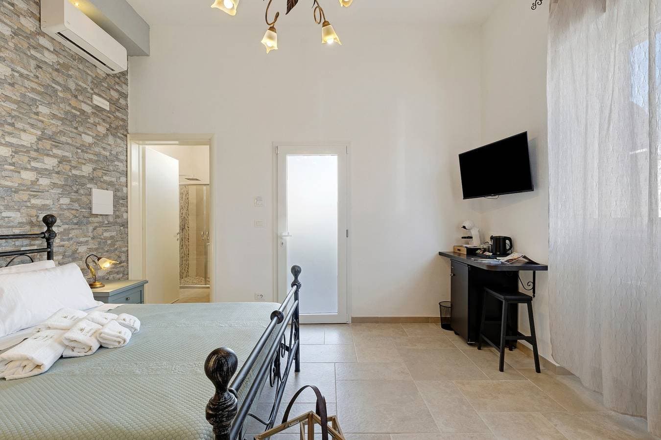 Foto 8 von 18: Bed & Breakfast 'L'Aurora – Zimmer Alba' mit Gemeinschaftsterrasse, WLAN und Klimaanlage