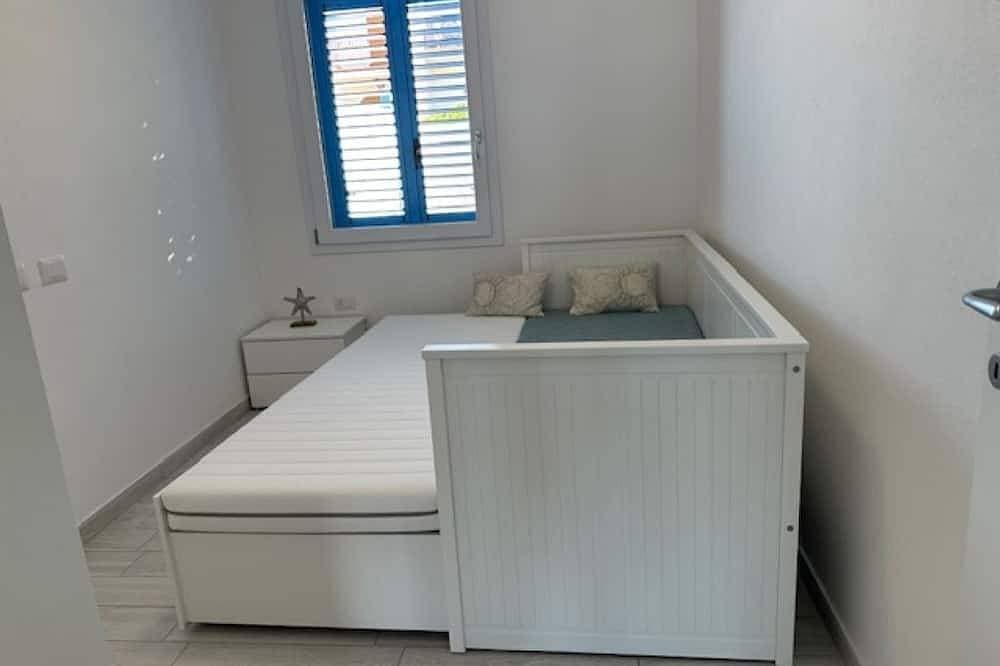 Foto 4 von 18: Villa Tramonto : Wohnung im Erdgeschoss mit direktem Meerblick