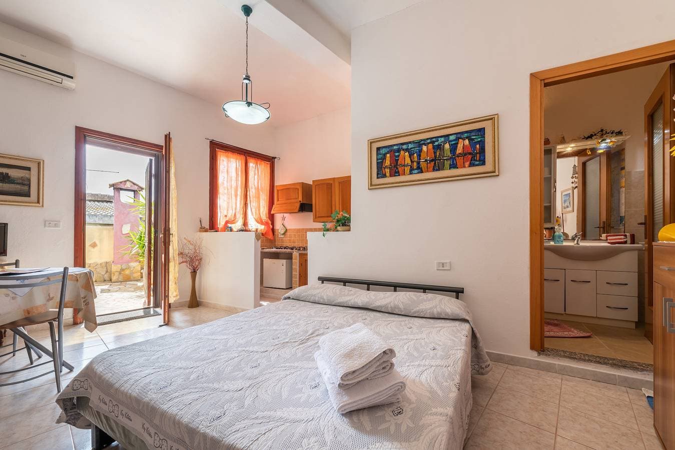 Foto 8 von 19: Ferienhaus 'Monolocale Il Girasole' in Stadtzentrumnähe mit Garten und Klimaanlage