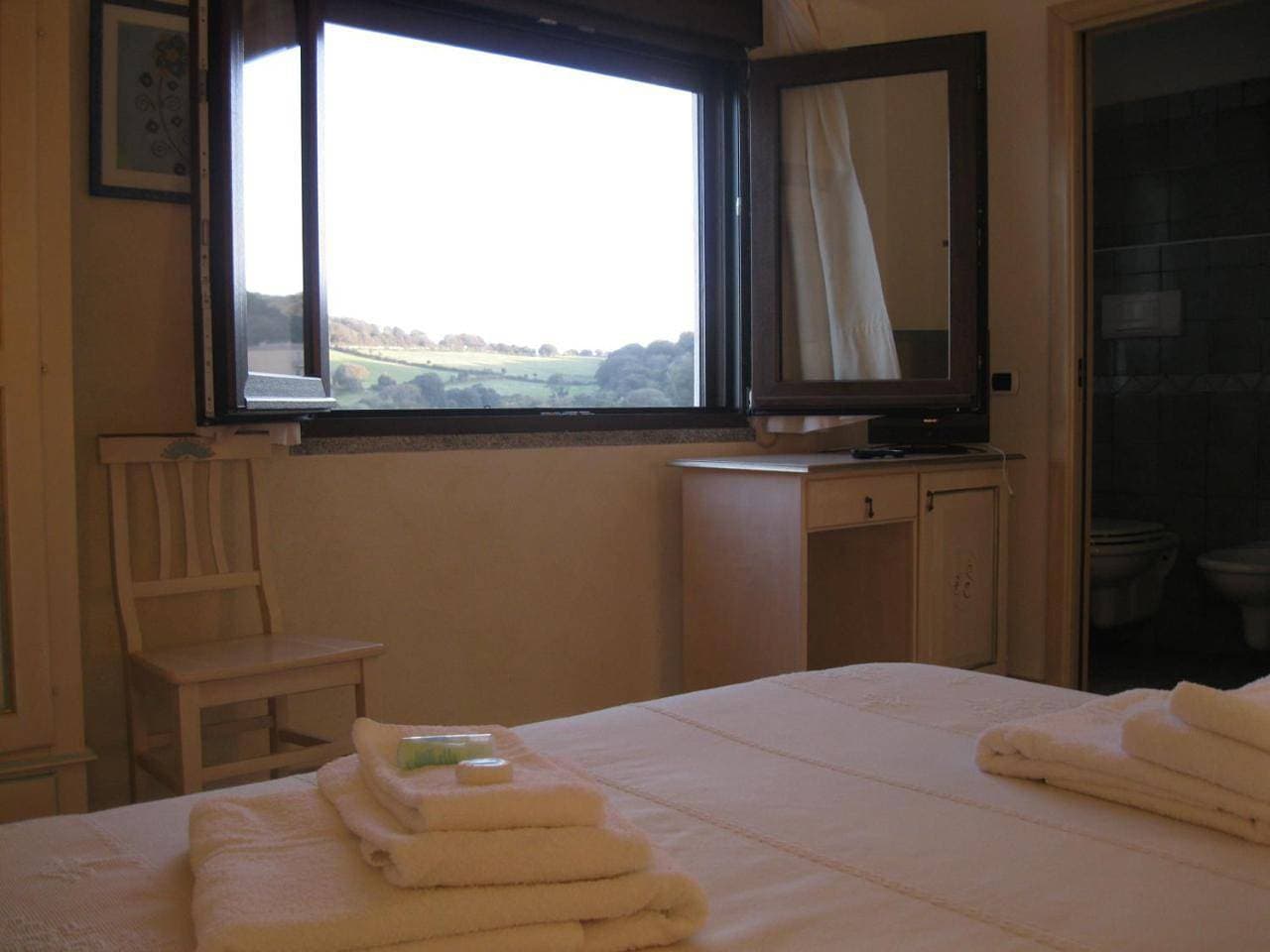 Foto 8 von 29: Triple Room with Mountain View