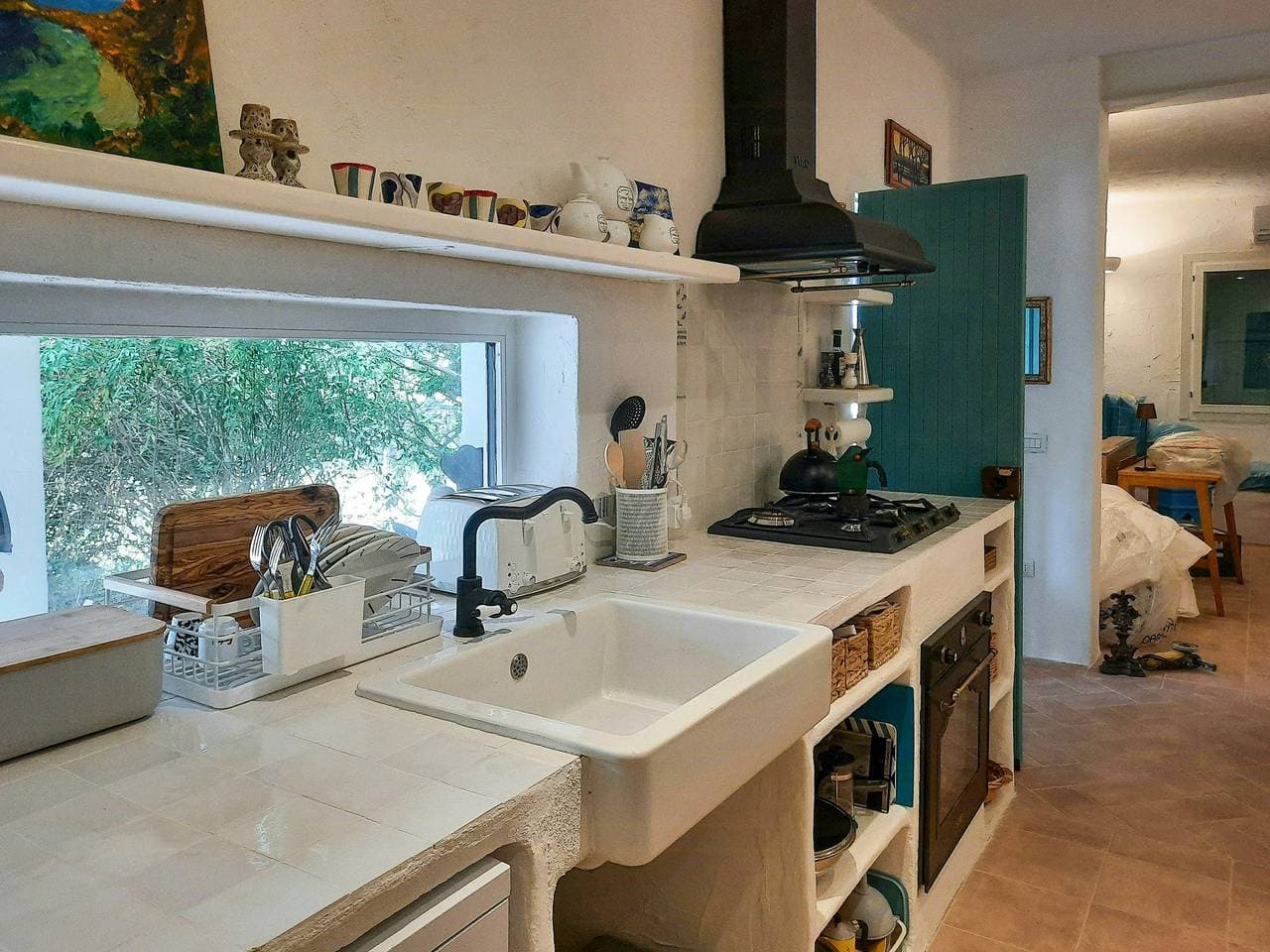 Foto 6 von 16: Haus mit Swimmingpool und einem Garten voller Obstbäume