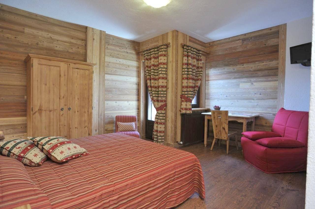 Foto 4 von 11: Quadruple Room