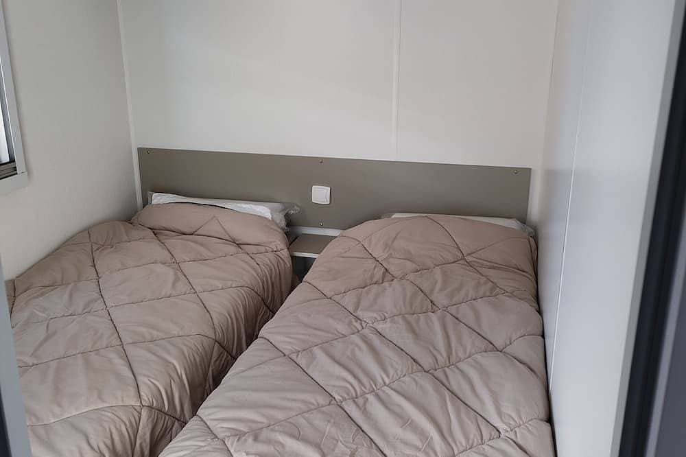 Foto 4 von 30: Mobil Home Dans Camping Le Coteau de la Marine