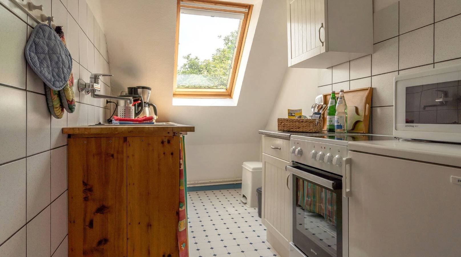 Foto 8 von 12: Ferienwohnung Silbermöwe mit Gemeinschaftsterrasse, Gemeinschaftsgarten und Wi-Fi