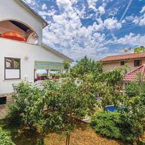 Foto 10 von 31: Ferienwohnung mit Terrasse und Klimaanlage