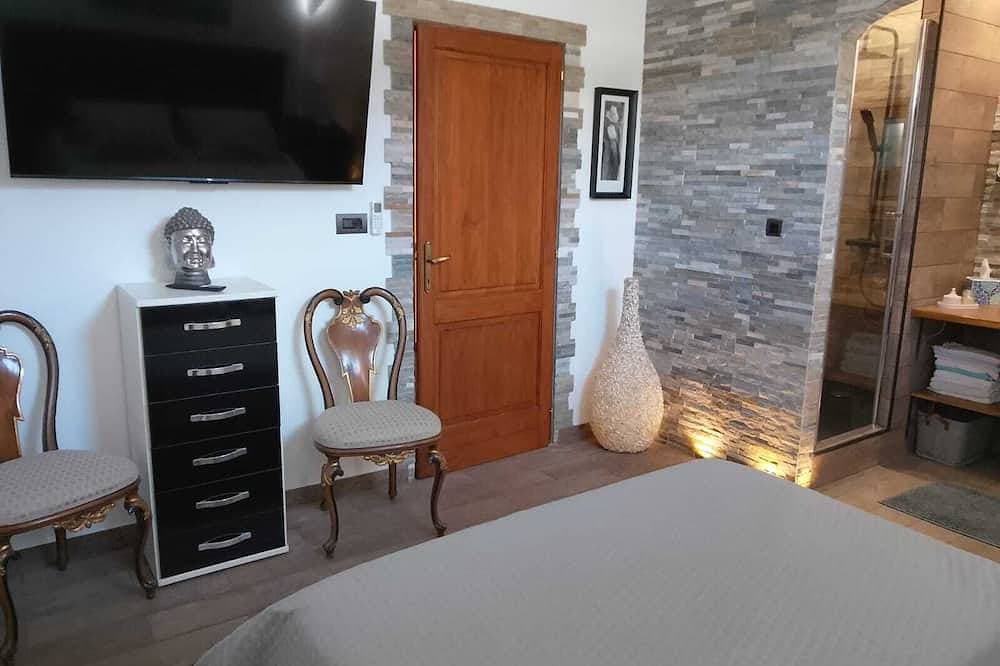 Foto 7 von 29: Suite-style room with a pool