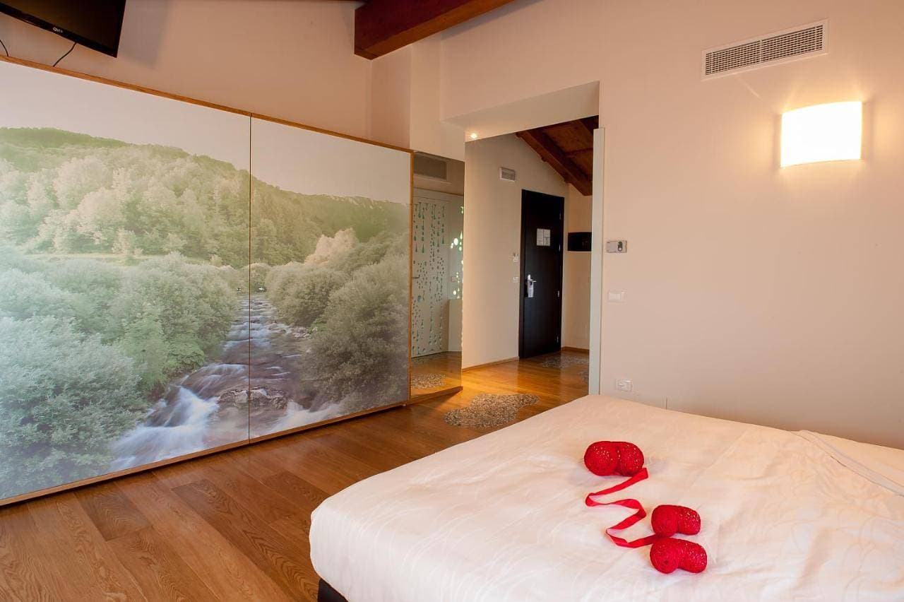 Foto 10 von 16: Suite with Whirlpool