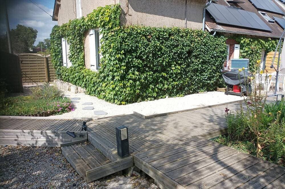 Foto 7 von 20: Komfortable Ferienwohnung in idyllischem Garten mit Kamin & Parkplatz