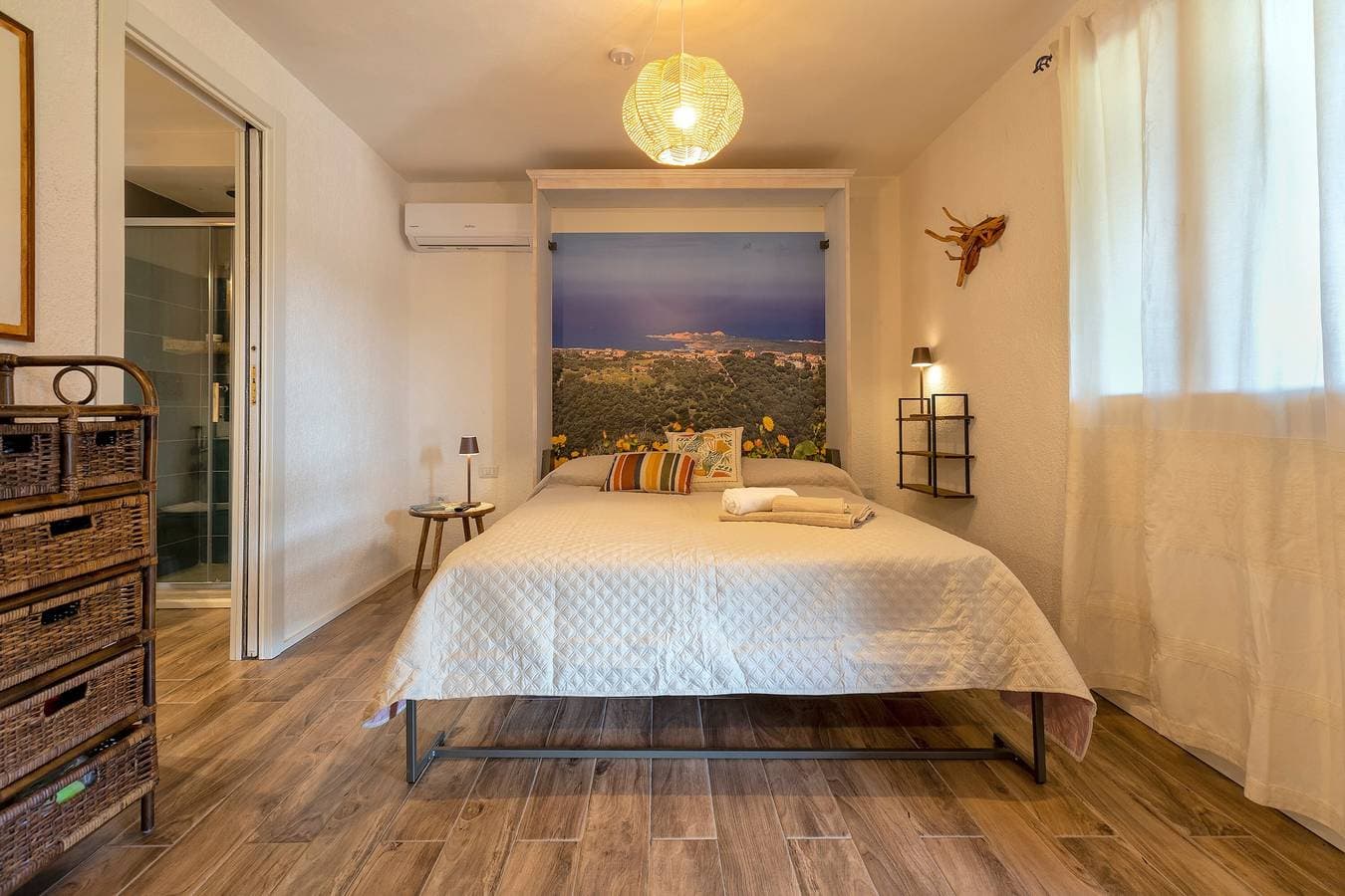 Foto 10 von 21: Einzimmerapartment 'Sa Domo Isola Rossa' mit Meerblick, privater Terrasse und Klimaanlage
