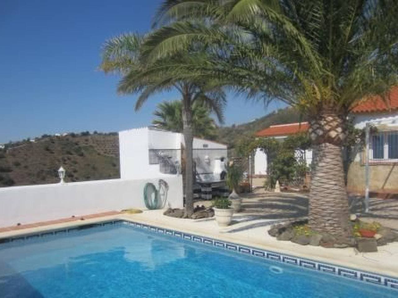 Foto 8 von 51: Casa Palmeras in Sayalonga mit Gepflegtem Garten