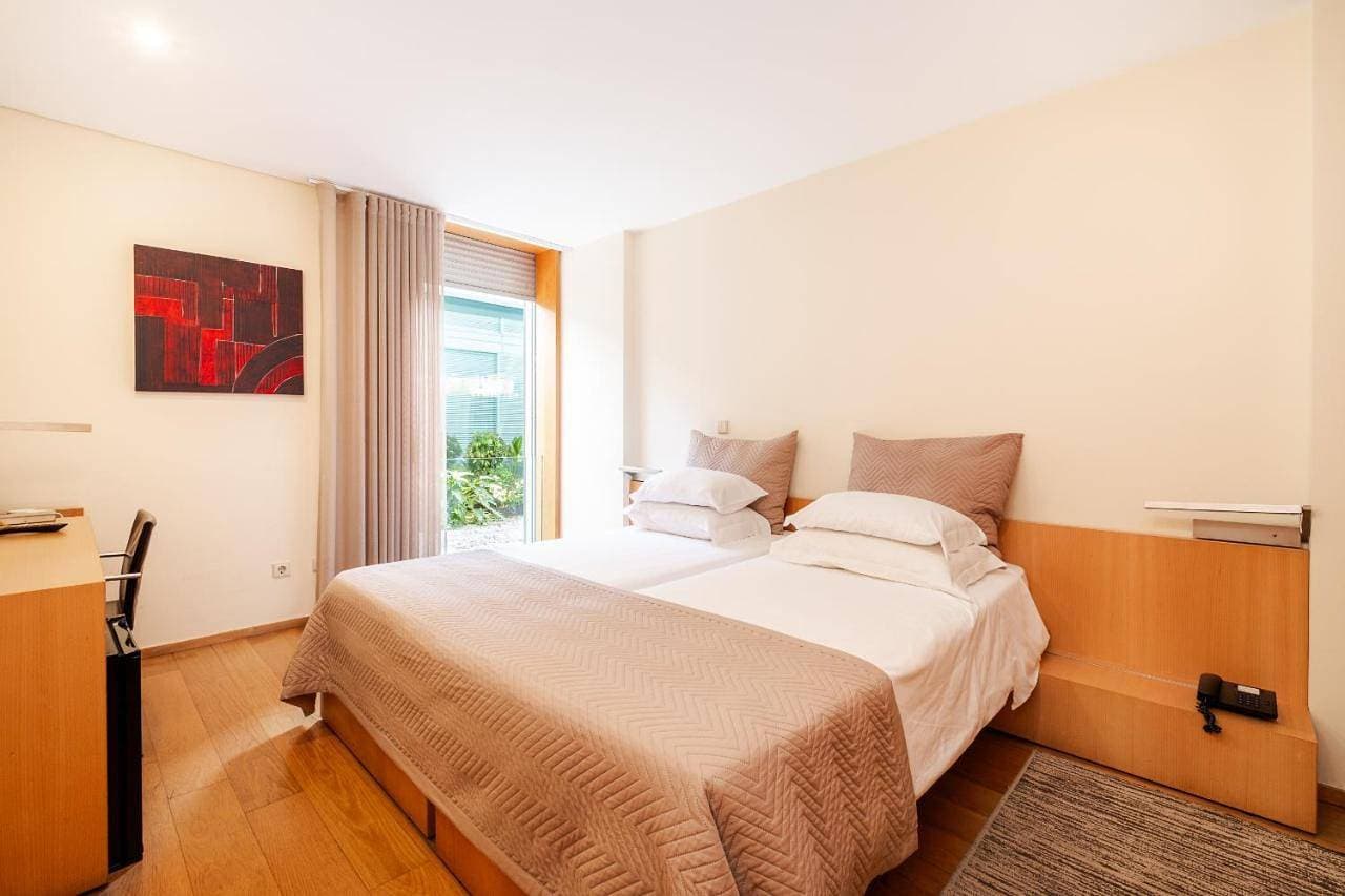 Foto 6 von 13: Double or Twin Room with Garden View