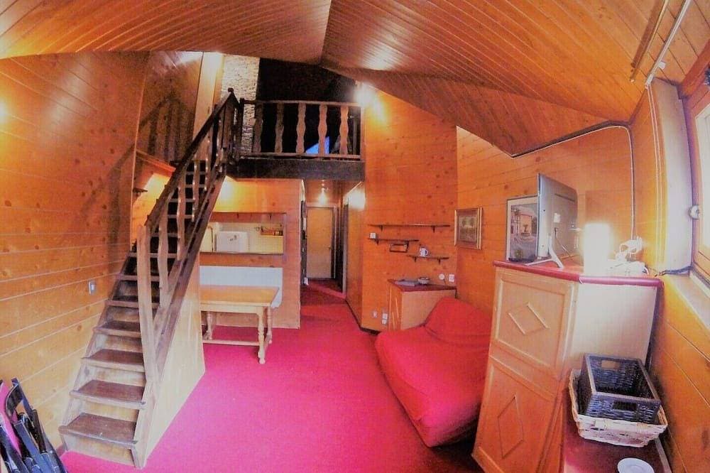 Foto 11 von 24: Wohnung mit Zwischengeschoss und Kamin