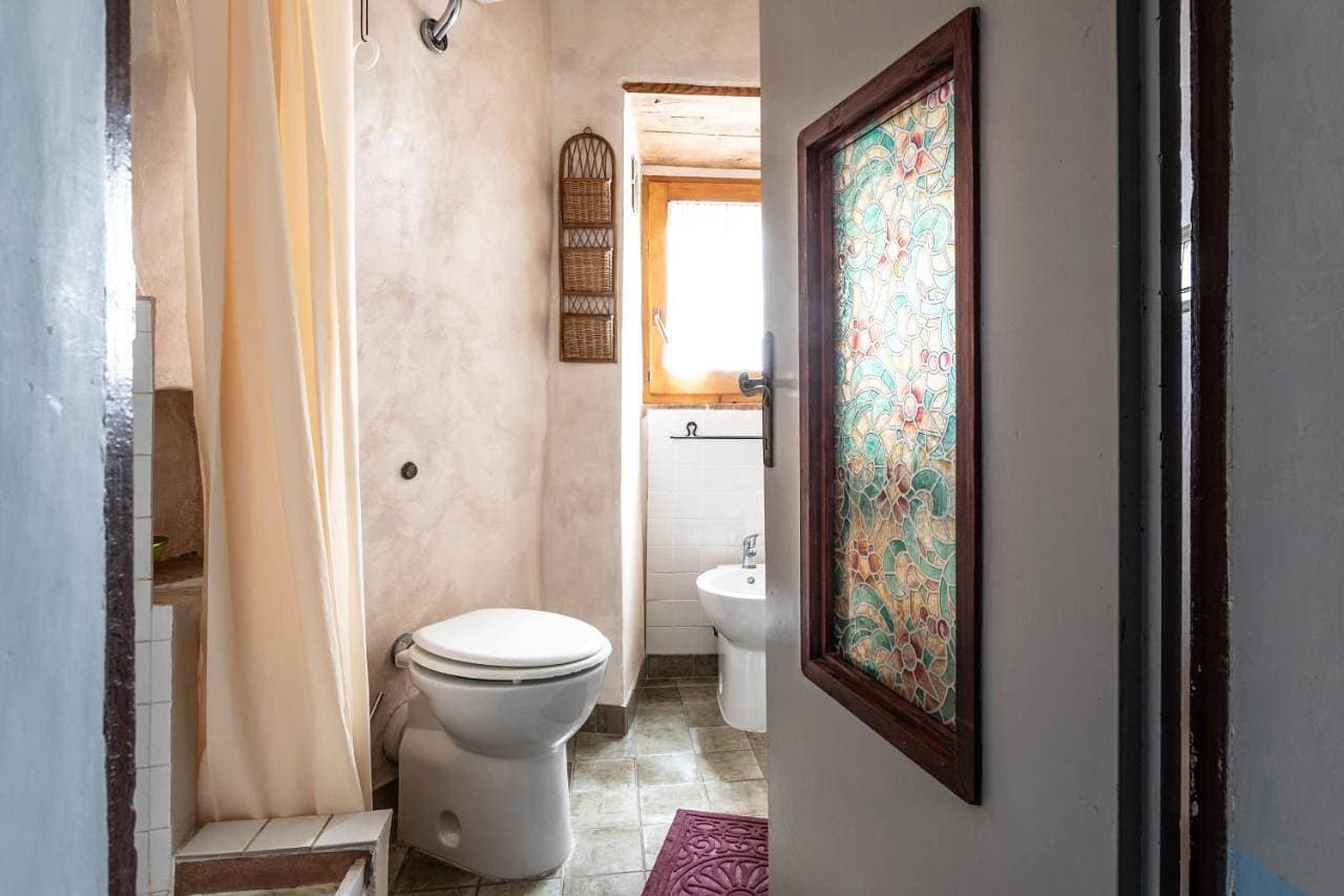 Foto 10 von 15: Quadruple Room with Private Bathroom