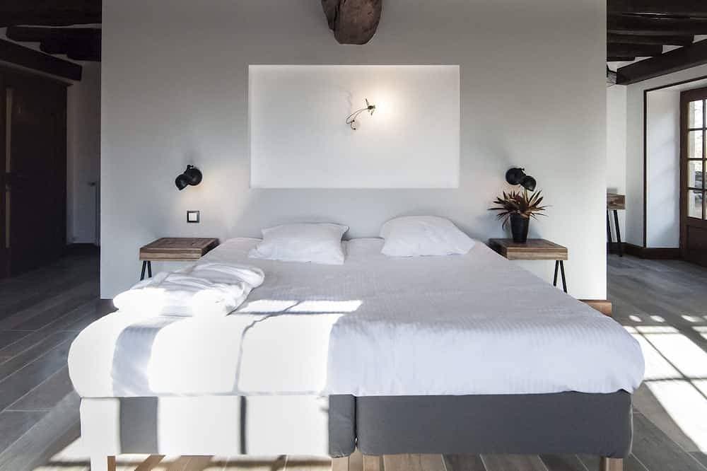 Foto 4 von 30: Dreibettzimmer-Deluxe-Ensuite-Gartenblick-Avec Sauna