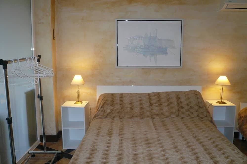 Foto 4 von 26: Gemütliche sonnige Wohnung in klimatisierter Villa (Geschlossener Privatparkplatz)