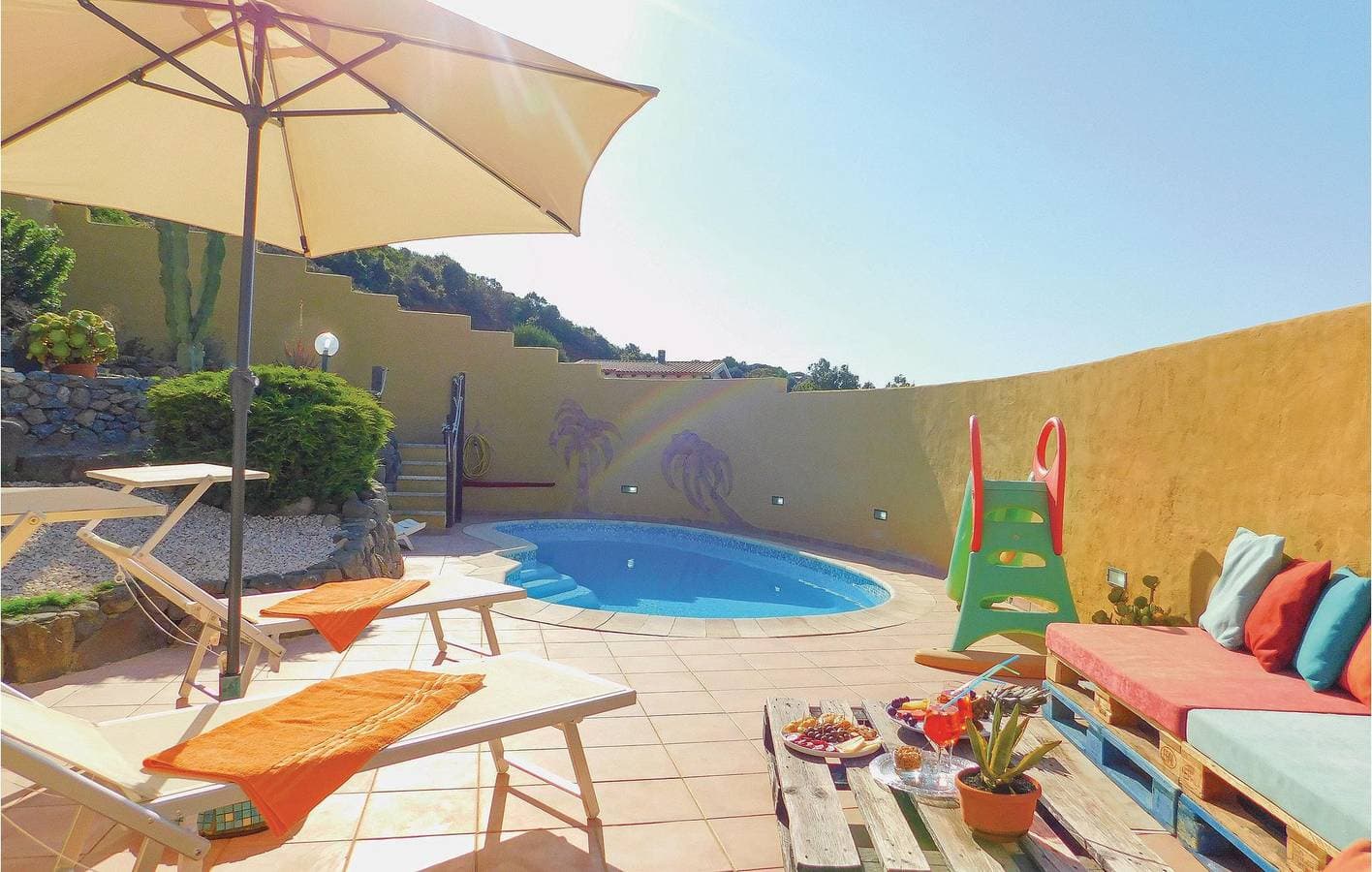 Foto 7 von 14: Rückzugsort am Pool: Gemütliches Apartment mit Garten und Internet