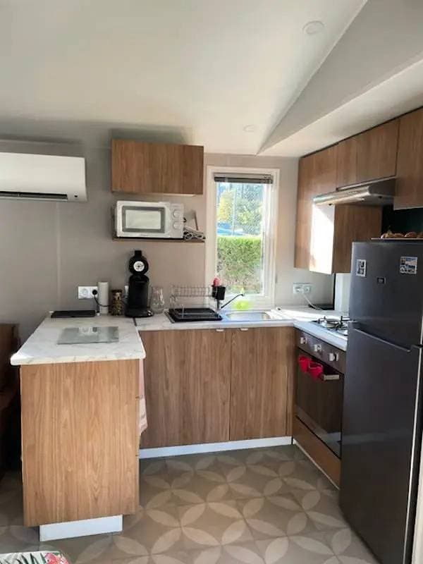 Foto 5 von 15: Mobilhome 3 chambres Camping Les Dunes de Contis