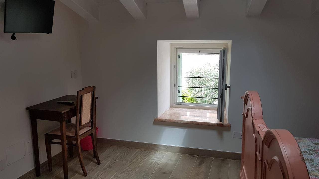 Foto 7 von 9: Double Room with Private Bathroom