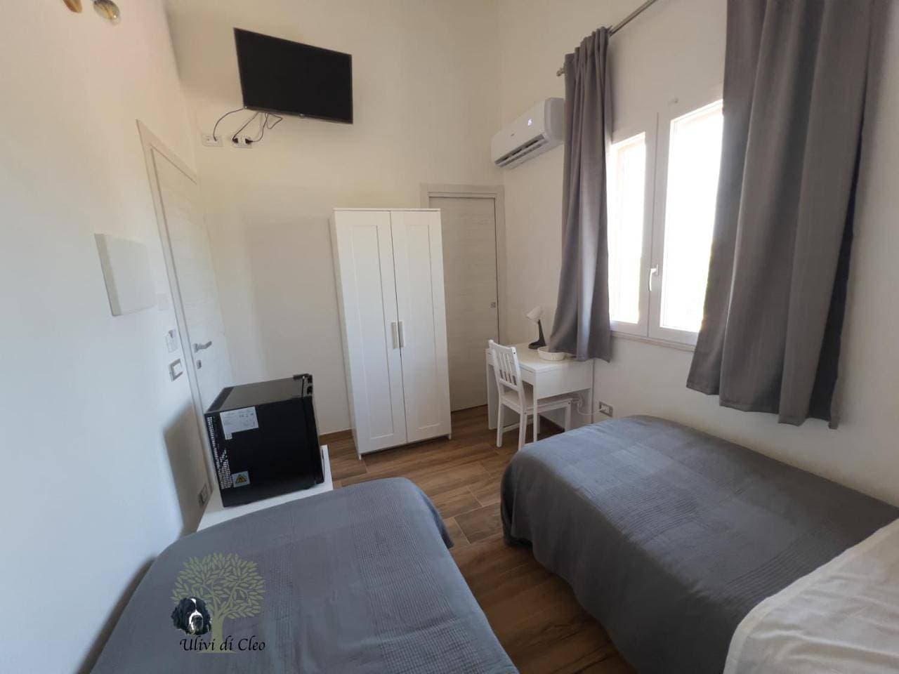 Foto 7 von 9: Twin Room with Private Bathroom