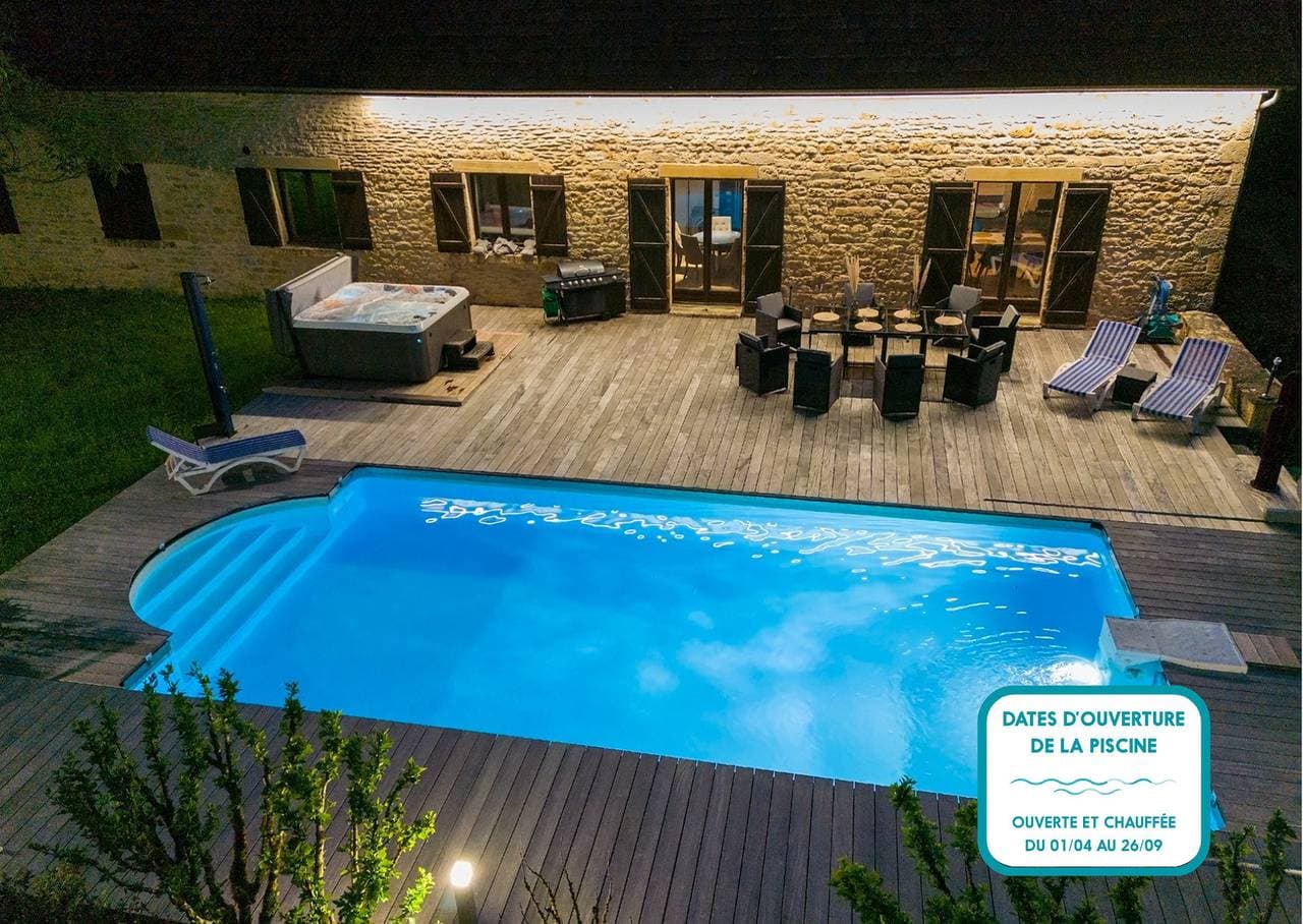 Foto 6 von 23: Piscine chauffée et jacuzzi - 4 adultes 4 enfants
