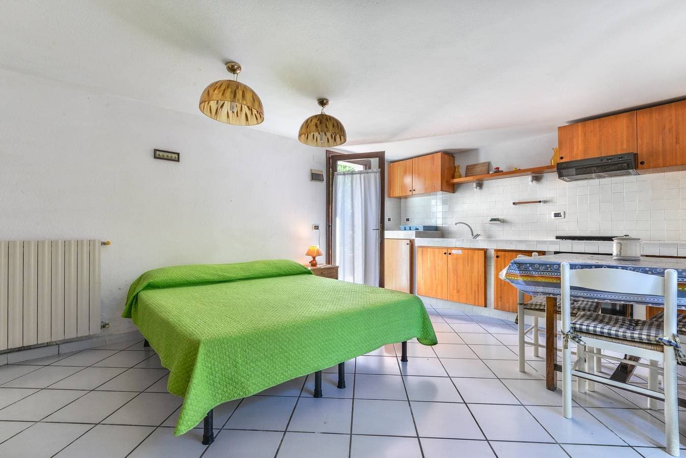 Foto 9 von 19: Einzimmerapartment 'Monolocale Nel Verde' mit Privatterrasse, Gemeinschaftsgarten und WLAN