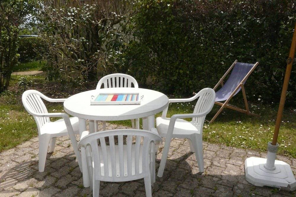 Foto 9 von 11: Kreisker 3 - Maison Jumelée, Jardin