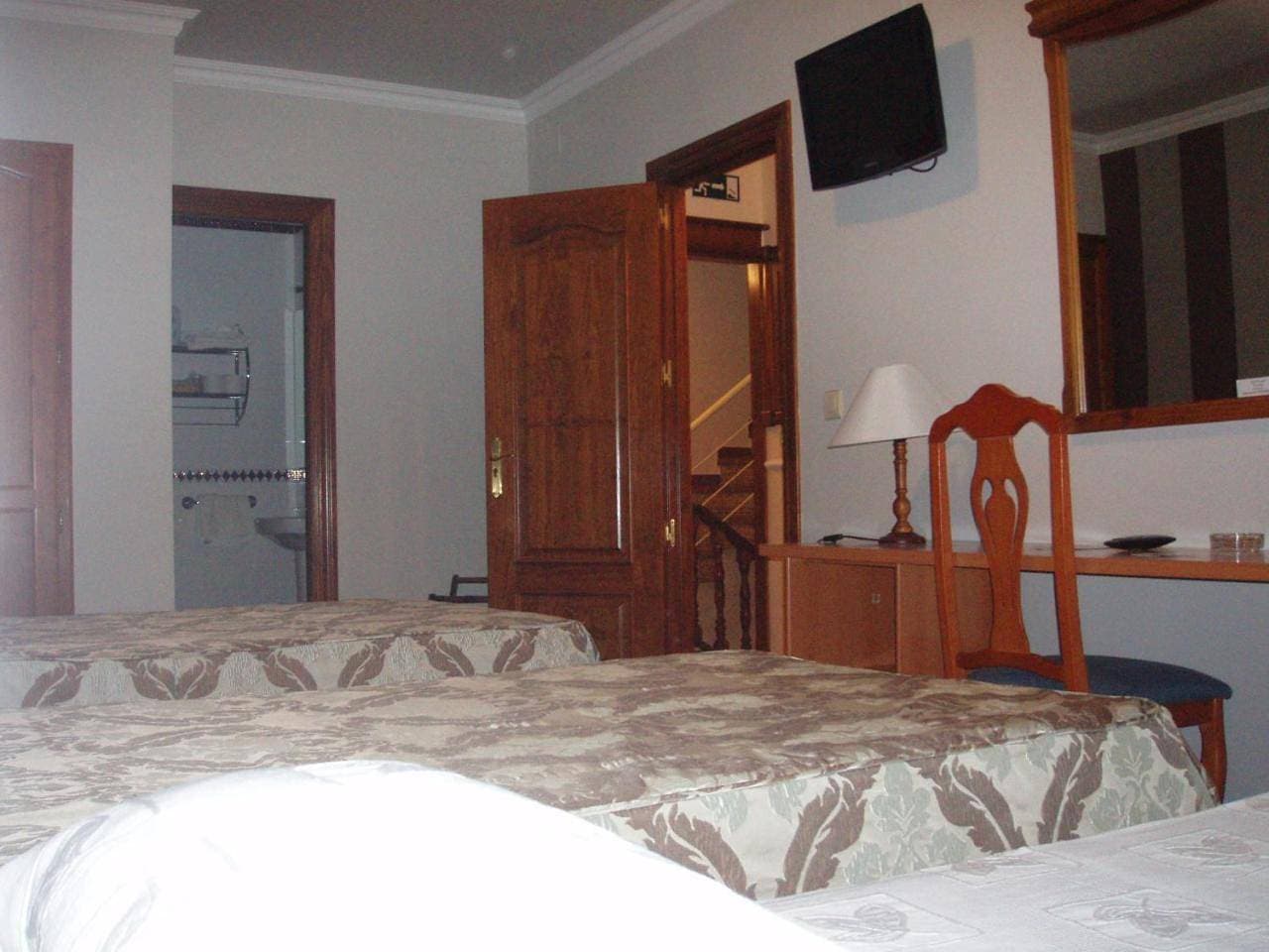 Foto 9 von 10: Triple Room