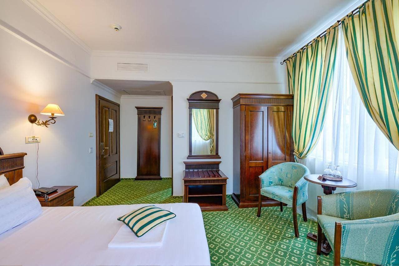 Foto 4 von 11: Triple Room