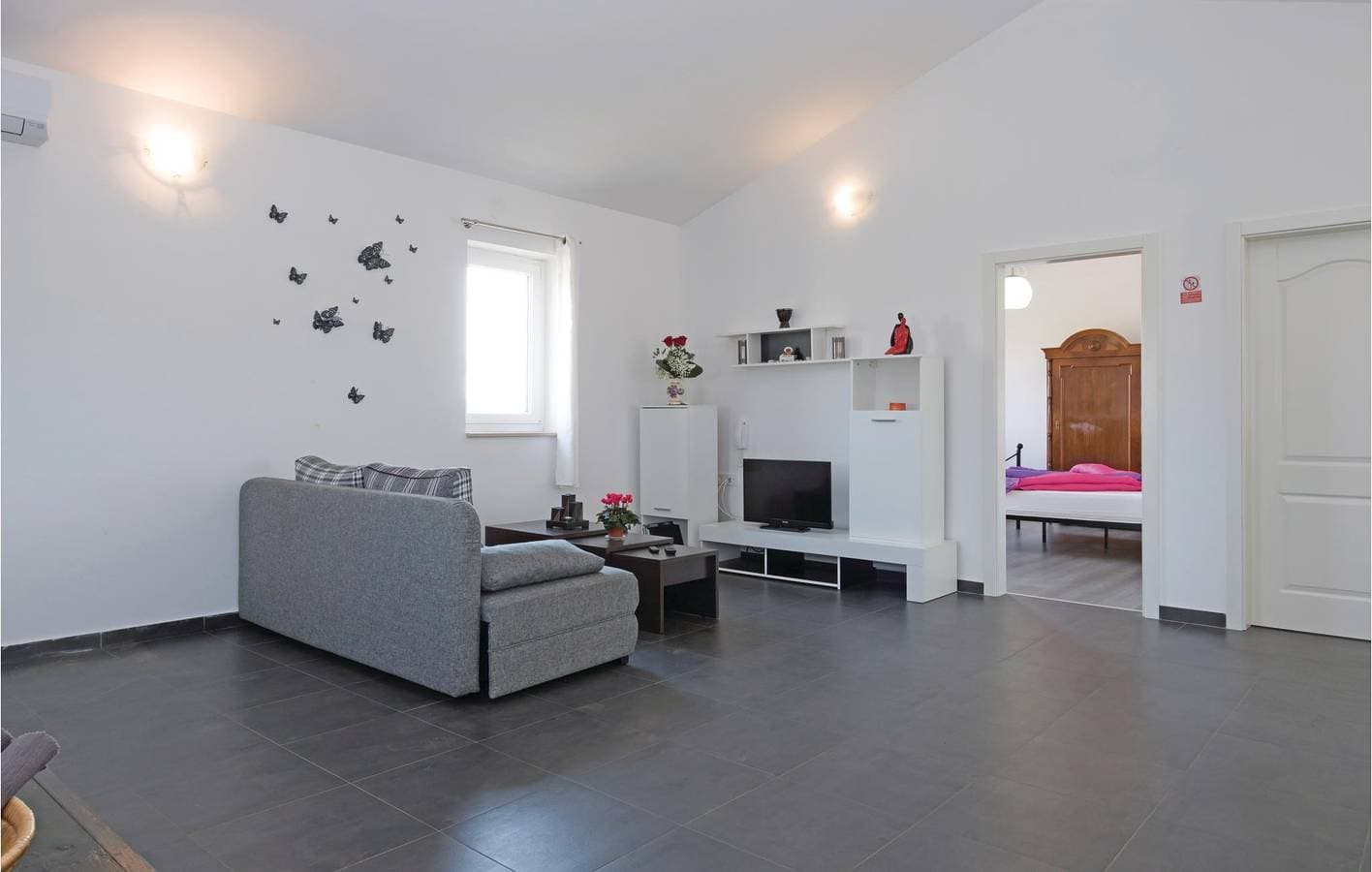 Foto 10 von 19: Gemütliche 2-Zimmer-Wohnung mit Pool und Terrasse in der Nähe des Stadtzentrums von Vodnjan