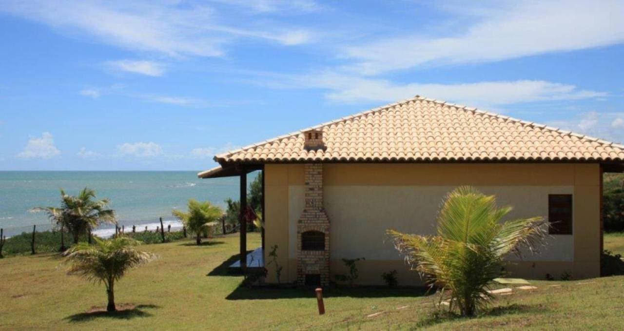 Casa espetacular em condomínio pé-na-areia, RZ15 1