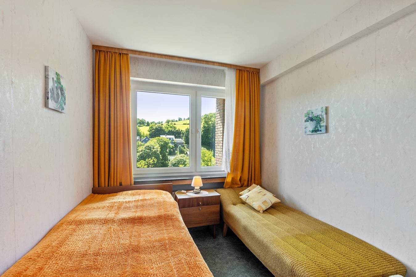 Foto 12 von 24: Ferienwohnung 'Haus Am Osterkopf' mit Bergblick, privater Terrasse und eigenem Garten