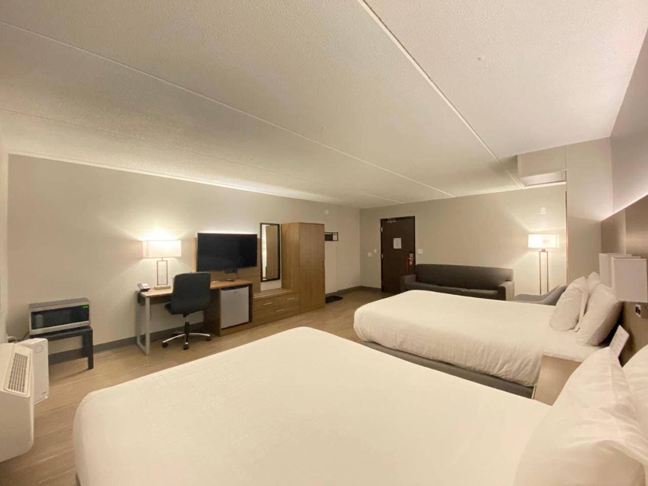 Foto 6 von 18: Queen Room with Two Queen Beds