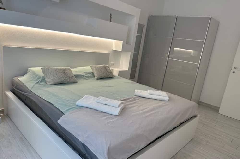 Foto 3 von 18: Villa Tramonto : Wohnung im Erdgeschoss mit direktem Meerblick