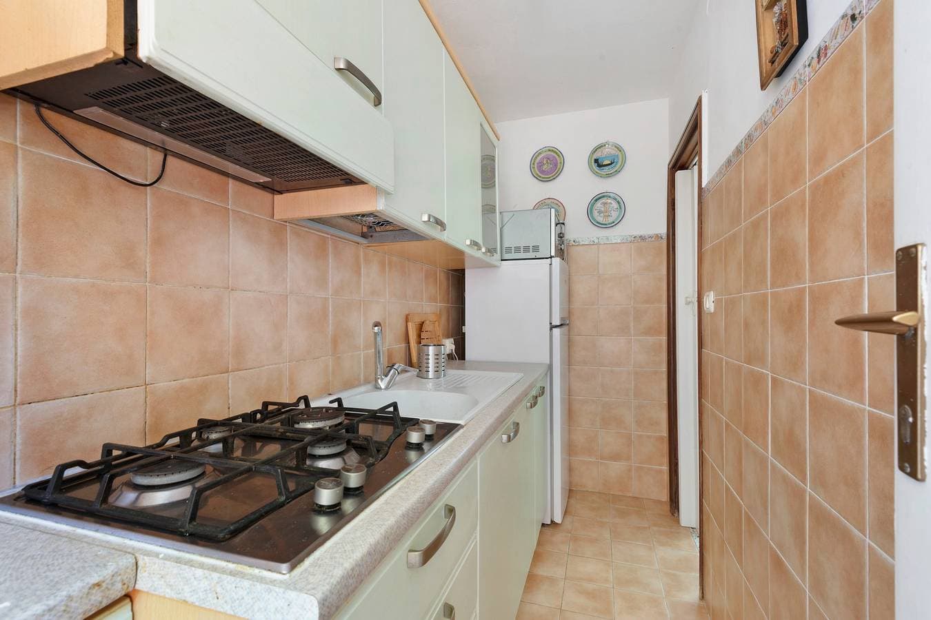Foto 11 von 25: Ferienwohnung 'Villetta Barabarca am Golfo Stella' mit Meerblick & privatem Garten