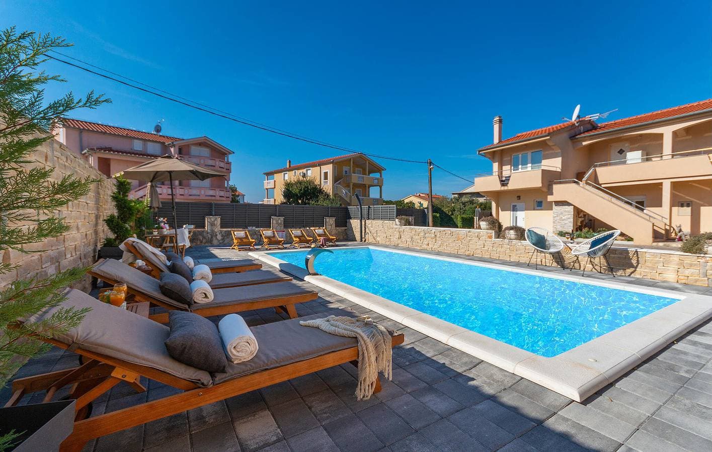 Foto 10 von 24: Gemütliche Ferienwohnung mit Pool, Terrasse und nur 1 km vom Strand entfernt