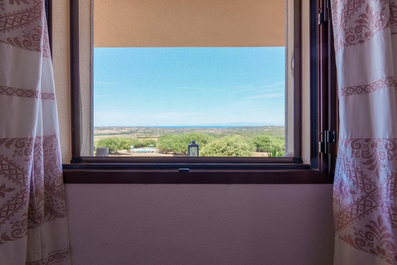 Foto 7 von 28: Ferienwohnung "Casa Ginepro Piscina E Vista Mare" mit Meerblick, Gemeinschaftspool und WLAN