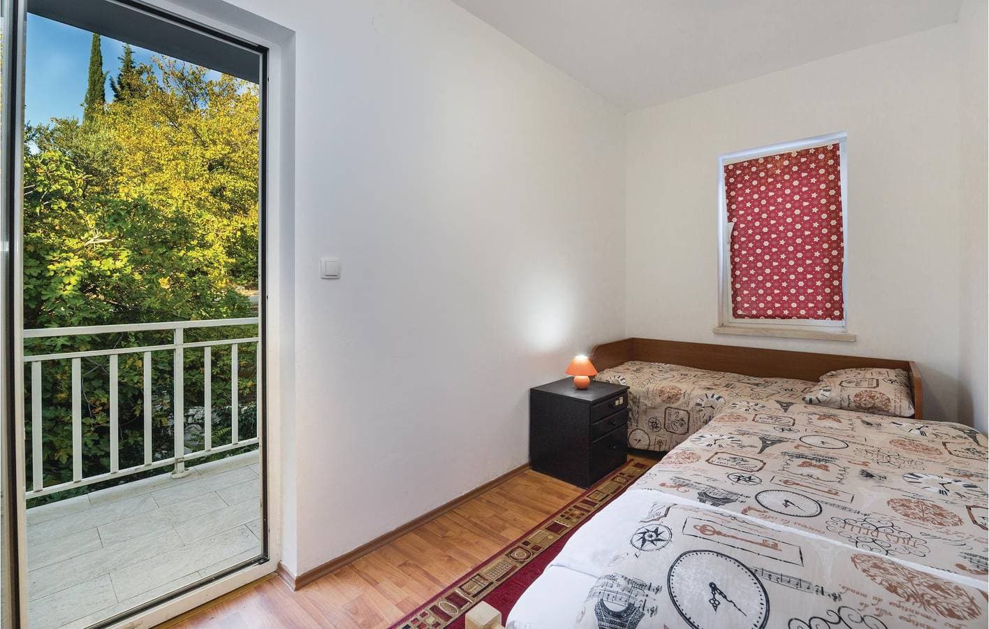 Foto 13 von 24: Gemütliche 300 m zum Strand: Klimatisierte Wohnung mit Terrasse und Parkplatz