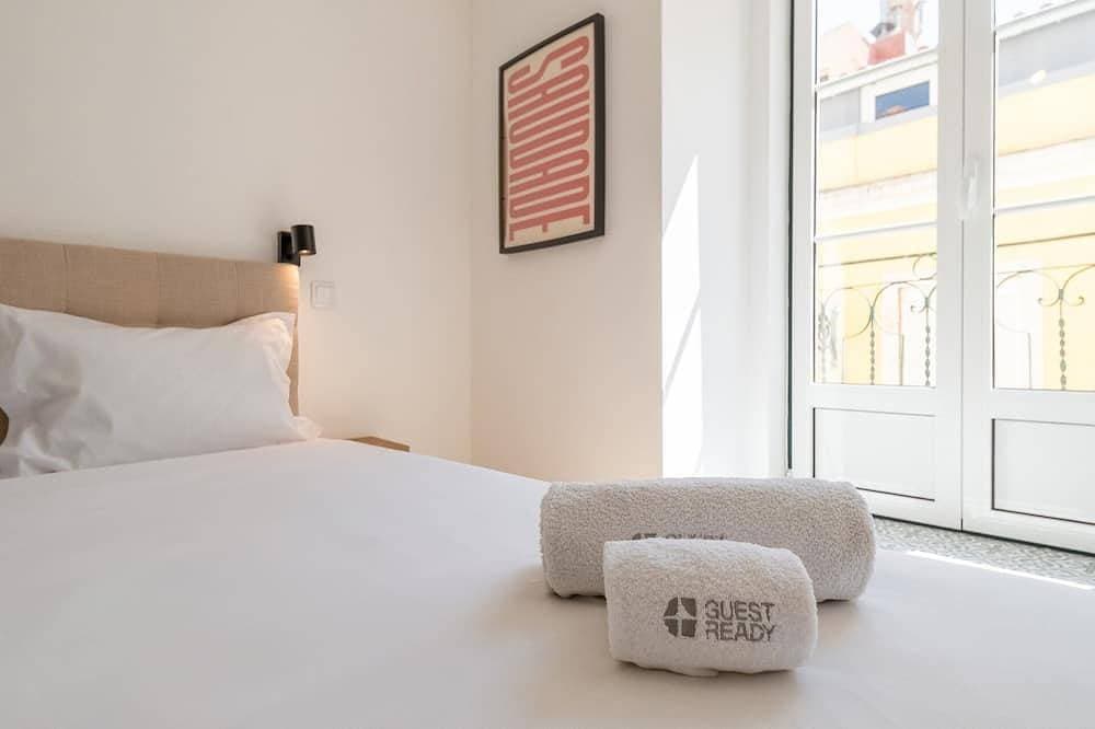 Foto 9 von 26: GuestReady - Carolina Building: Erdgeschoss Rechts