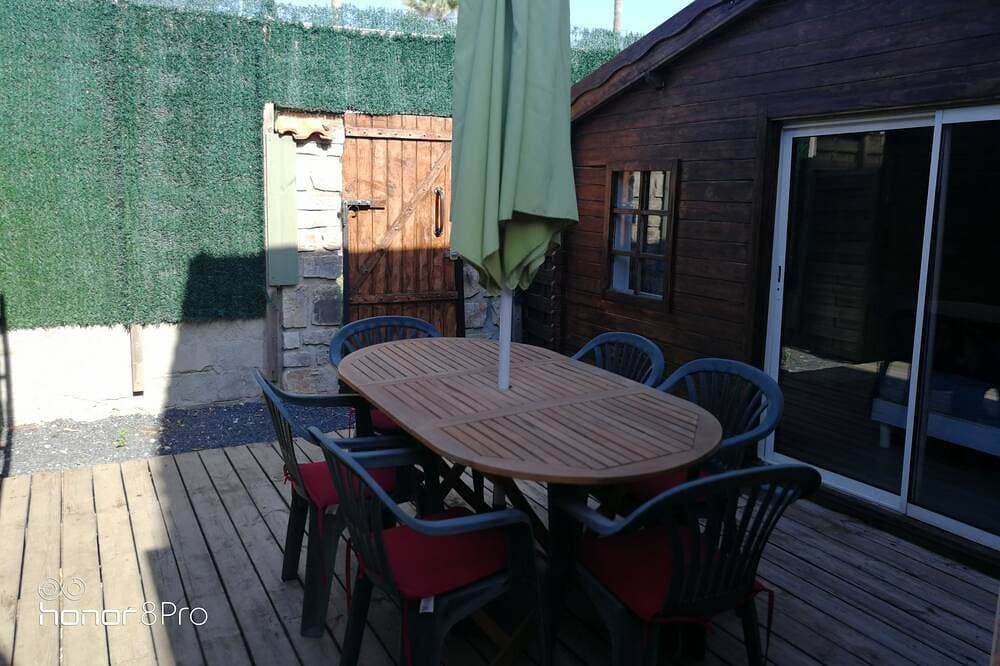 Foto 8 von 8: Two chalets (+40 m2) separated by a small patio 200m from the beach