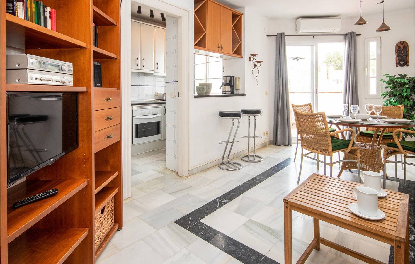Foto 4 von 36: Klimatisierte Wohnung mit Pool und Terrasse