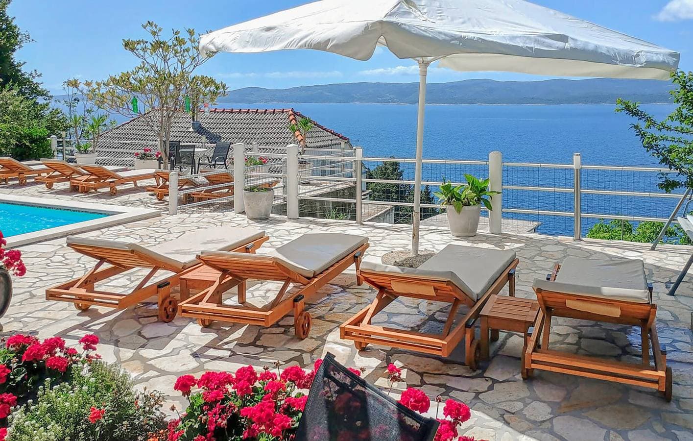 Foto 5 von 36: Gemütliche Ferienwohnung in der Nähe des Juto-Strandes mit Pool und WLAN